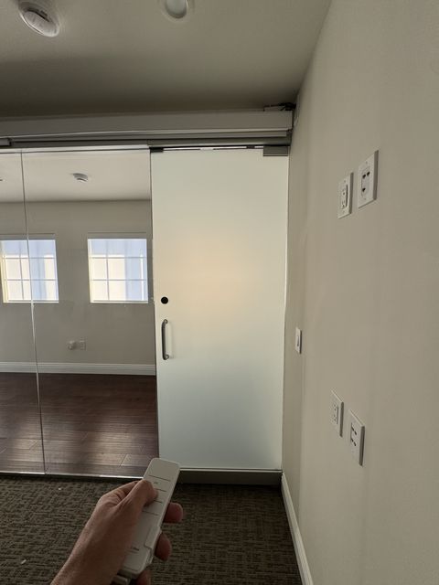 Frosted privacy mode on a meeting room wall in a Hermosa Beach office