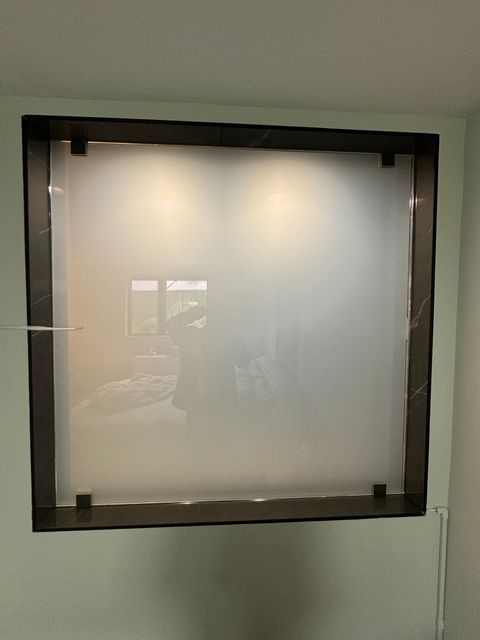 Smart View Smart Film installed PDLC smart film on a large interior window, demonstrating switchable privacy mode.