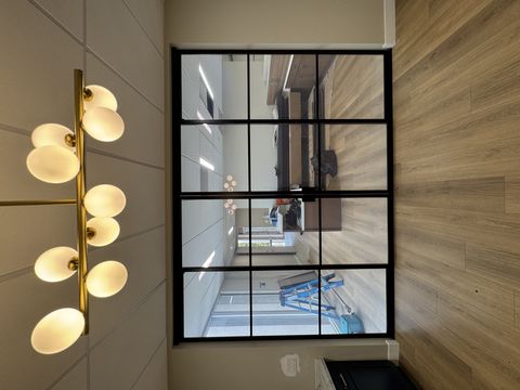 Smart glass sliding door Pasadena in clear mode — 110 sqft PDLC panel in transparent state at a commercial office