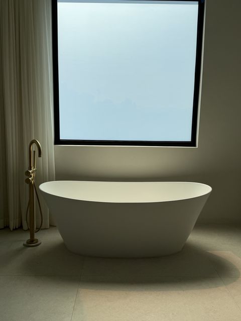 The same bathroom window switched to flat opaque frosted privacy