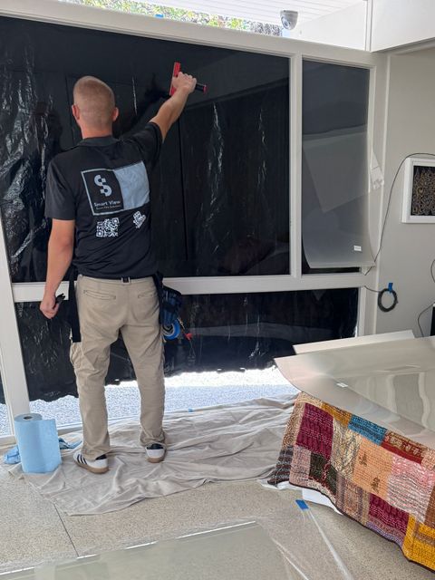 Smart View installer applying smart film to the master bedroom courtyard glass wall, Palm Springs