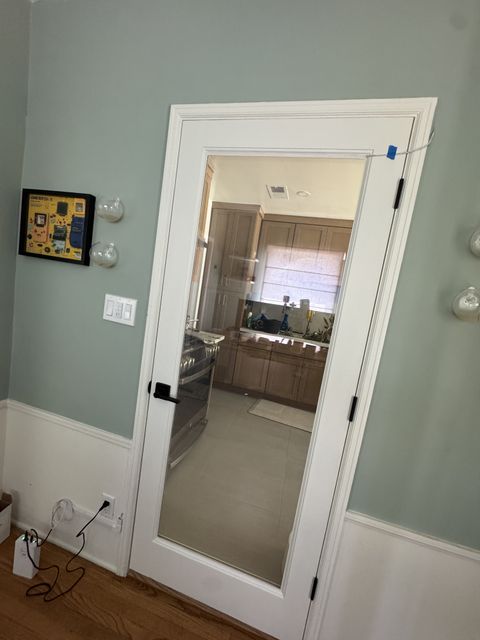 Burbank kitchen door with the smart glass clear, looking straight through the glazed door into the kitchen