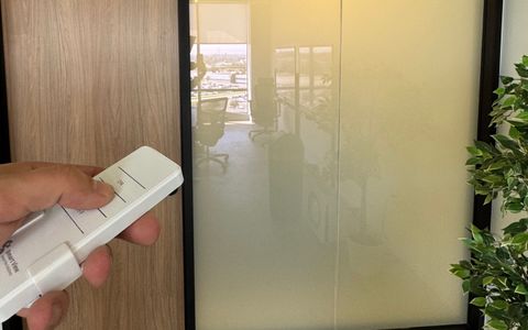 Remote frosting smart glass office partition in El Segundo workspace, second view