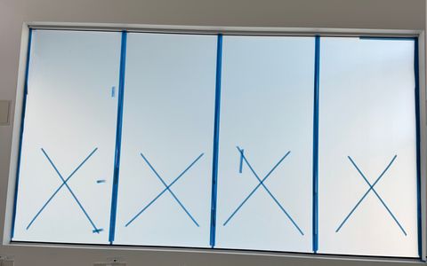 Smart glass classroom window in a Los Angeles school with all four panels frosted for privacy