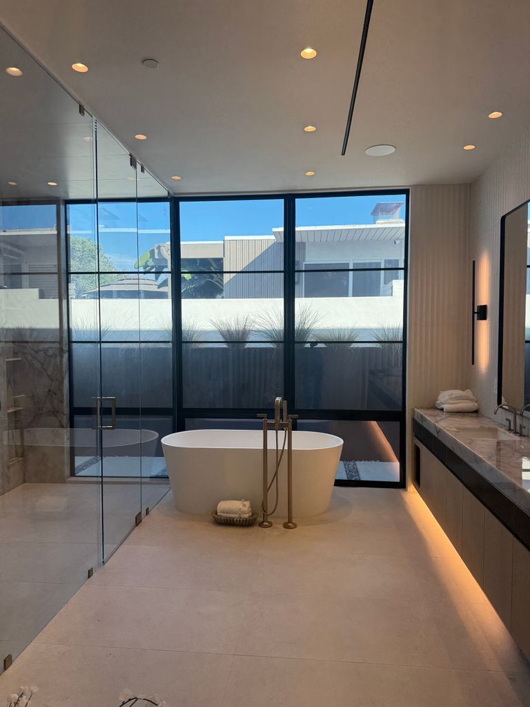 Newport Beach master bath window with switchable smart film in the clear state