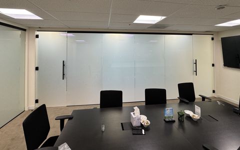 Smart glass office walls in Thousand Oaks, conference room glass wall and doors switched to frosted privacy white