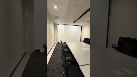 Office glass partition switching from clear to frosted