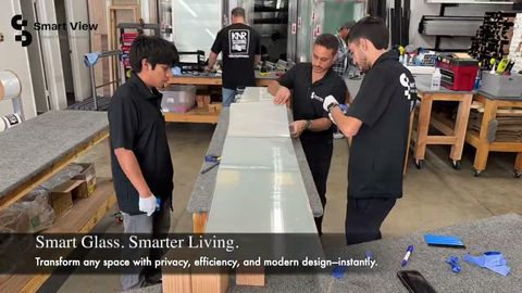 Smart View crew laminating a switchable smart glass panel at the Canoga Park facility