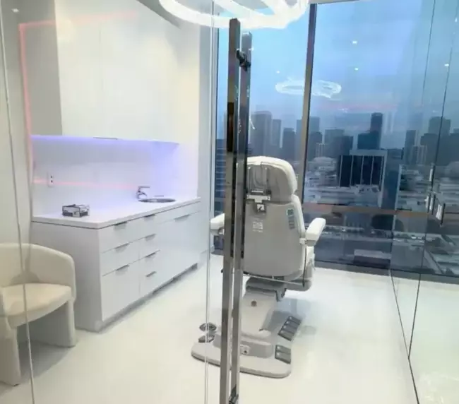 Smart glass medical room in Beverly Hills clinic with skyline view