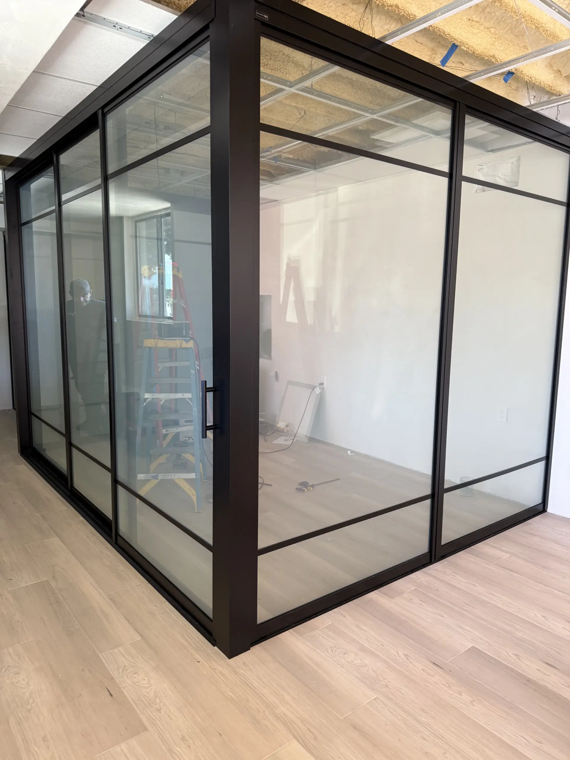 Smart glass sliding partition doors with PDLC film, Santa Barbara treatment rooms by Smart View and KNR Sliding Doors