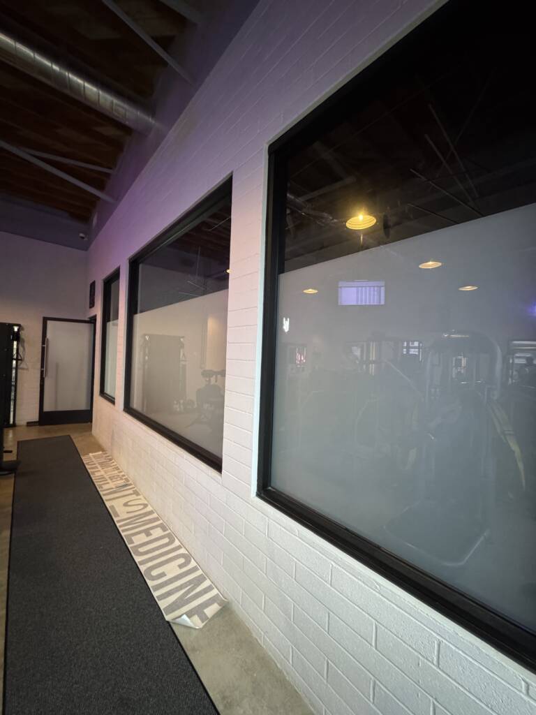 Gym interior window privacy glass in Ventura CA in frosted mode