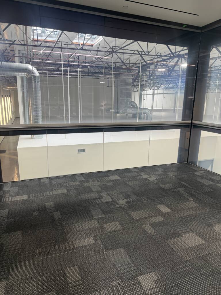 Commercial privacy glass wall in Carlsbad CA conference room