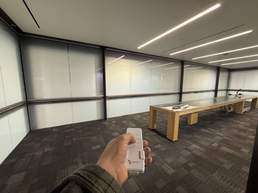 Large conference room with switchable privacy glass walls in Carlsbad CA