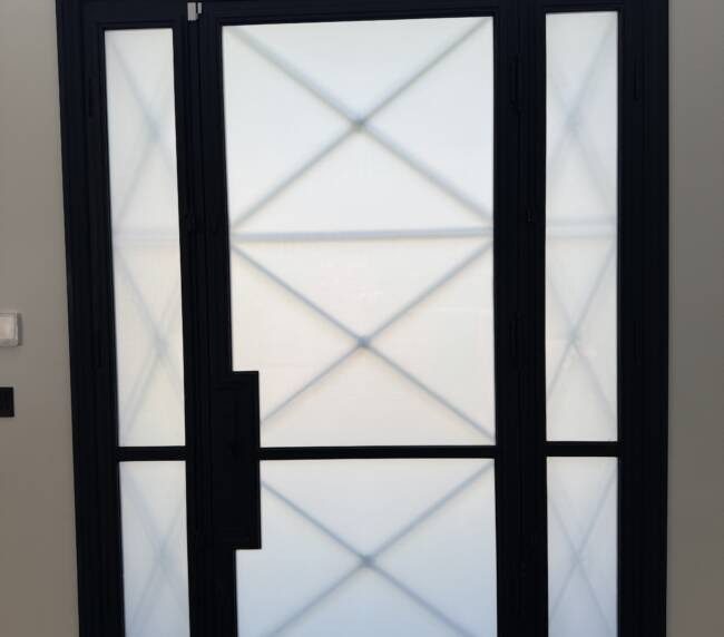 Smart film front door installation in La Cañada CA showing opaque privacy mode
