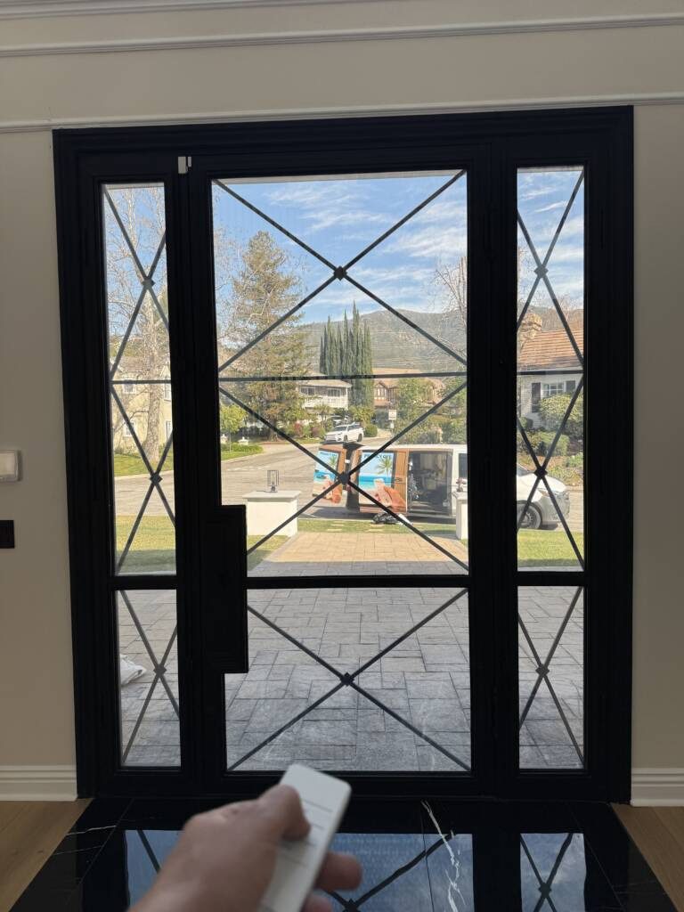 Smart film front door in La Cañada CA showing clear transparent mode