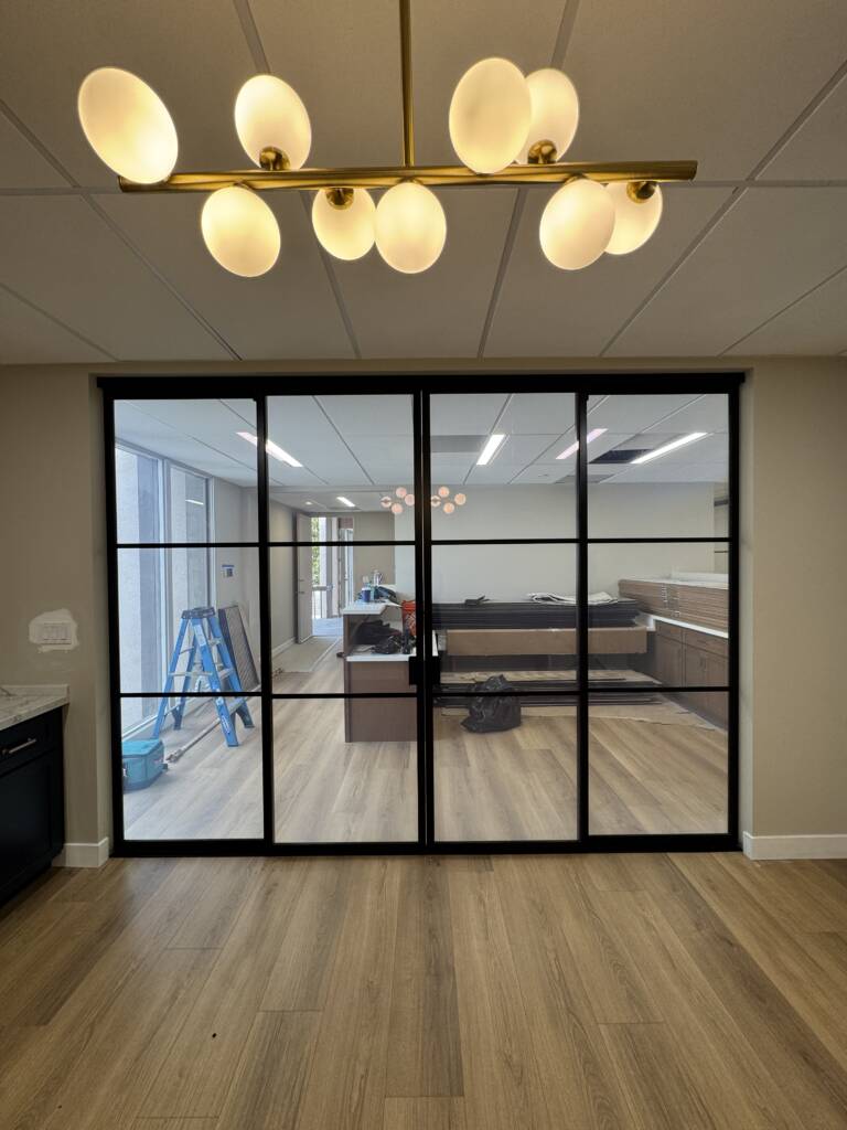 Sliding smart glass door installed in a Pasadena home for instant privacy and modern style.