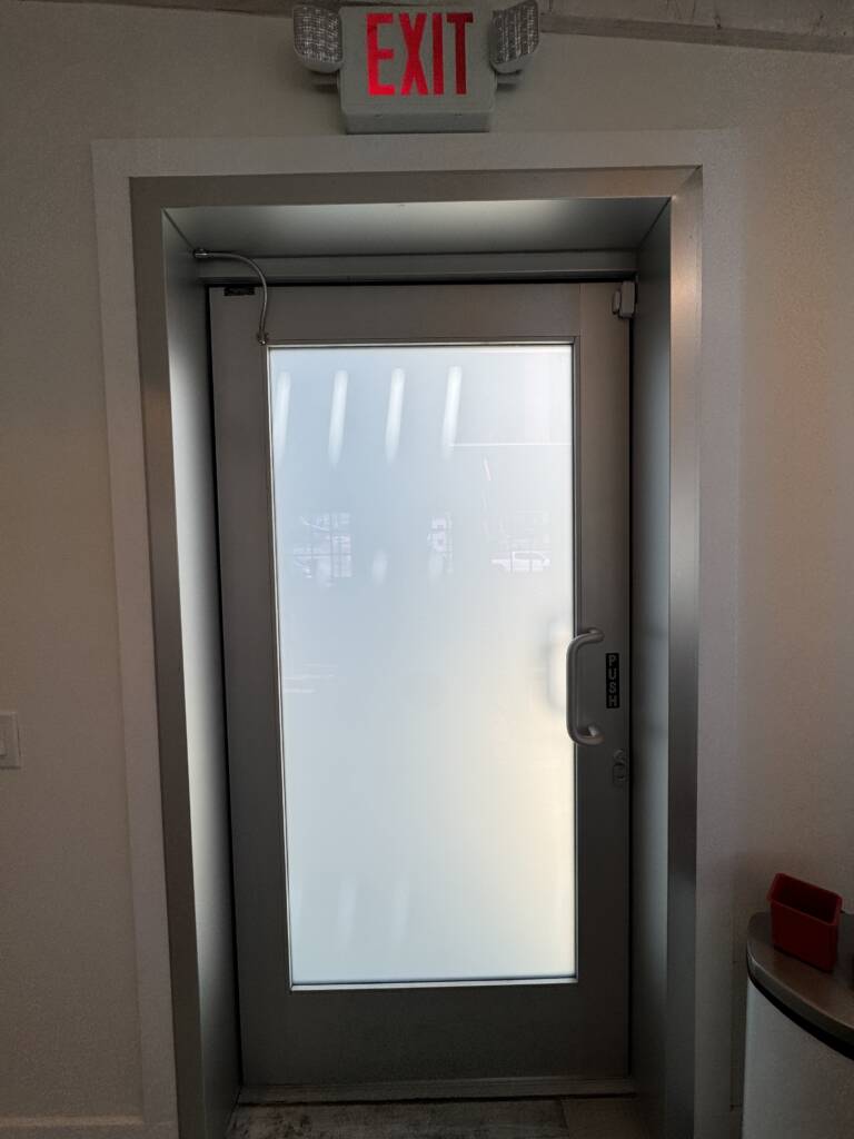 Premium privacy glass doors and windows in Santa Monica featuring electronically controlled frosted glass technology.