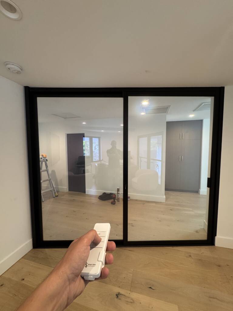 Smart glass home office in Huntington Beach shown in clear mode