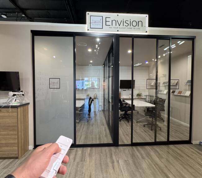 Smart Glass Closets Woodland Hills showroom featuring a fully transparent smart glass closet display