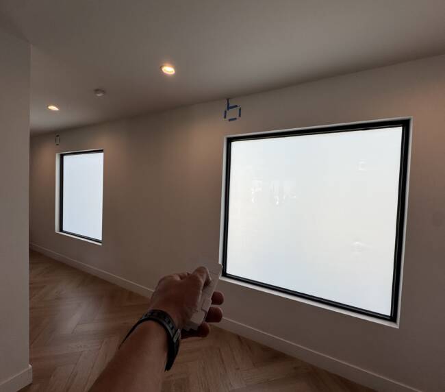 Smart glass windows Tarzana &mdash; picture window and clerestory in frosted state with wireless remote toggling both together