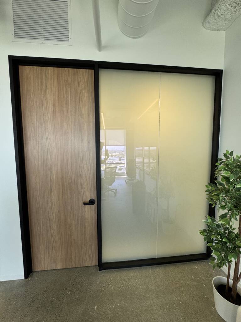 Switchable smart glass in an Orange County luxury residence offering privacy control and elegant architectural integration.