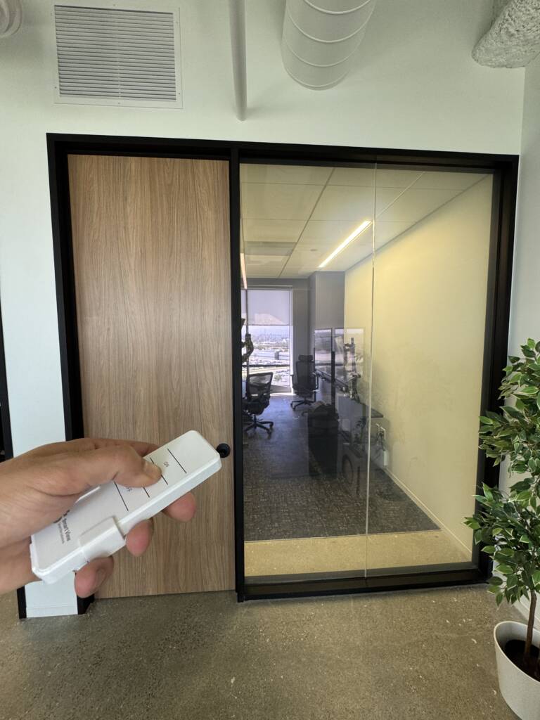 Remote setting smart glass office partition clear in El Segundo workspace, second view